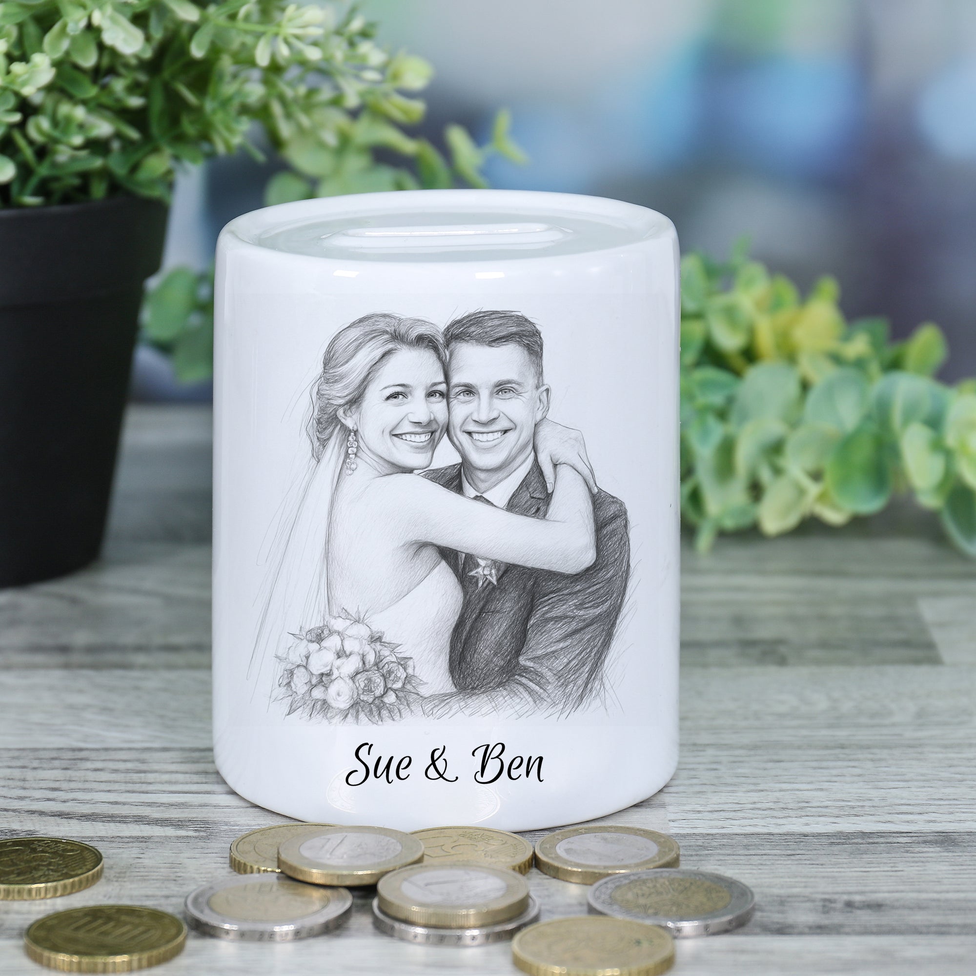 Spardose mit Bleistiftzeichnung und Text